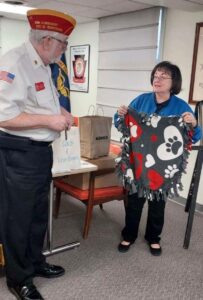 PDP/PNP Ruth Moyse Presents Blankets for VA Hospital to Commandant Brady